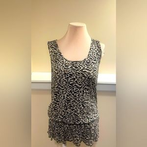 Leopard print sleeveless top.